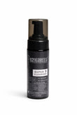 A pump bottle of 92degrees Super 5 Age Defense Cleanser, a facial cleansing product with niacinamide, collagen, vitamin C, E, and hyaluronic acid.